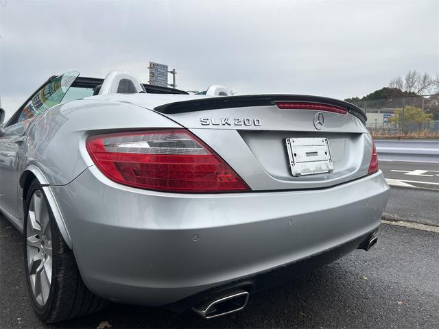 ＳＬＫ 　ＨＩＤヘッドライト　ＬＥＤポジション　純正ＨＤＤナビゲーション　ＥＴＣ　　パークトロ二クス　本革シート　シートヒーター　純正１７インチＡＷ　Ｐシフト　Ｐスタート　カーボンリップ　禁煙車（58枚目）