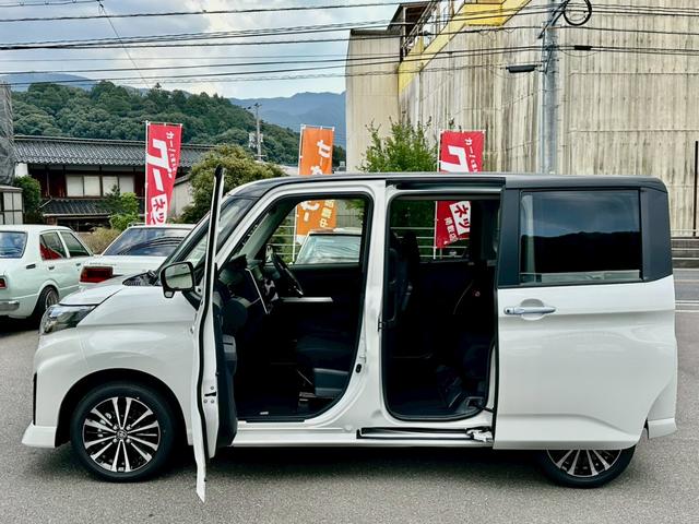 ルーミー カスタムG-T パノラミックビューモニター/9インチディスプレイ/ステアリングスイッチ/運転席・助手席シートヒーター/シートバックテーブル/運転席シート上下アジャスター/ウォークスルー/格納式リヤドアサンシェード(28枚目)