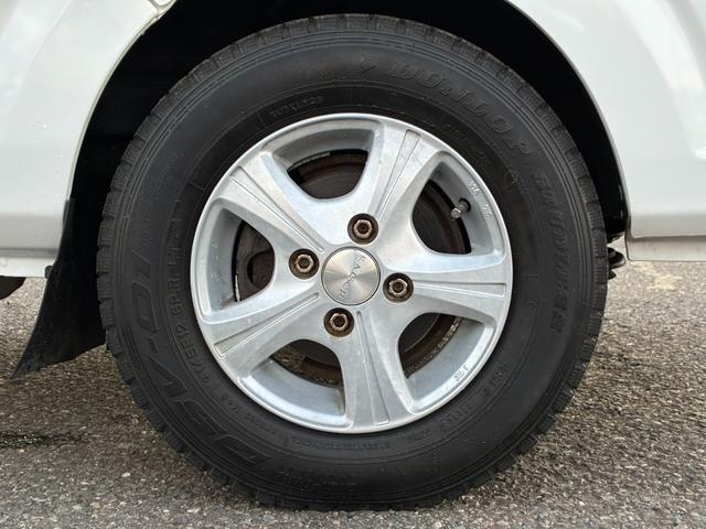 キャリイトラック 頑丈ダンプ 4WD 土砂禁ダンプ パネル型鳥居 下開リアゲート 荷台内寸:長さ190cm幅138cm アオリ高さ31cm マレル式 三方開 フォグランプ 社外12インチAW オートマ パワステ エアコン ABS(17枚目)