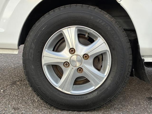 キャリイトラック 頑丈ダンプ 4WD 土砂禁ダンプ パネル型鳥居 下開リアゲート 荷台内寸:長さ190cm幅138cm アオリ高さ31cm マレル式 三方開 フォグランプ 社外12インチAW オートマ パワステ エアコン ABS(19枚目)