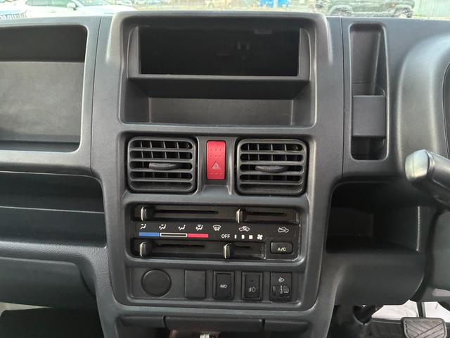 キャリイトラック 頑丈ダンプ 4WD 土砂禁ダンプ パネル型鳥居 下開リアゲート 荷台内寸:長さ190cm幅138cm アオリ高さ31cm マレル式 三方開 フォグランプ 社外12インチAW オートマ パワステ エアコン ABS(48枚目)