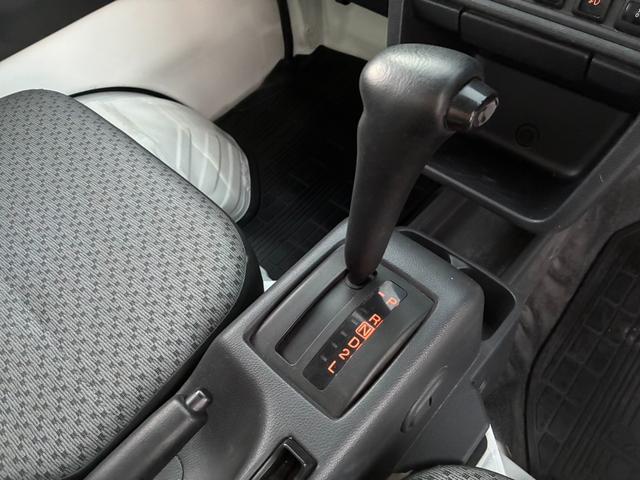 キャリイトラック 頑丈ダンプ 4WD 土砂禁ダンプ パネル型鳥居 下開リアゲート 荷台内寸:長さ190cm幅138cm アオリ高さ31cm マレル式 三方開 フォグランプ 社外12インチAW オートマ パワステ エアコン ABS(50枚目)