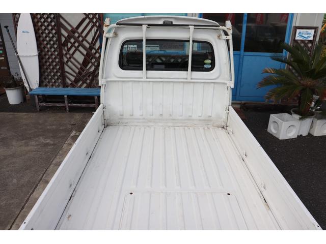 サンバートラック 赤帽 赤帽 スーパーチャージャー MT5 ハイルーフ YOKOHAMA GEOLANDAR KT ナビ キーレス ETC 作業灯 オーバーヘッドシェルフ エアコン ドアバイザー 三方開(49枚目)