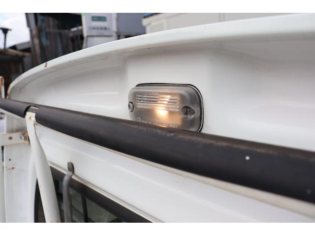 サンバートラック 赤帽 赤帽 スーパーチャージャー MT5 ハイルーフ YOKOHAMA GEOLANDAR KT ナビ キーレス ETC 作業灯 オーバーヘッドシェルフ エアコン ドアバイザー 三方開(50枚目)