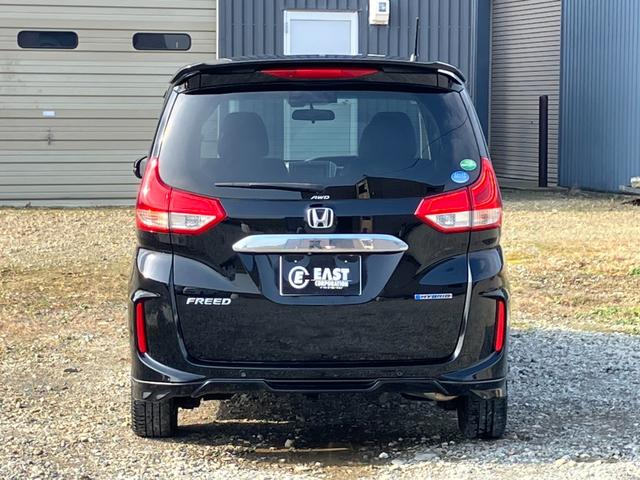 フリードハイブリッド ハイブリッド・Gホンダセンシング 4WD 本州仕入 後期型 ワンオーナー 寒冷地仕様 社外フルセグナビ バックカメラ 後席モニター シートヒーター ハーフレザーシート フルフラット 両側電動スライドドア LEDヘッドライト ETC(7枚目)