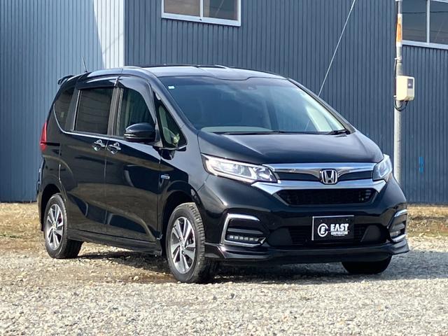 フリードハイブリッド ハイブリッド・Gホンダセンシング 4WD 本州仕入 後期型 ワンオーナー 寒冷地仕様 社外フルセグナビ バックカメラ 後席モニター シートヒーター ハーフレザーシート フルフラット 両側電動スライドドア LEDヘッドライト ETC(23枚目)