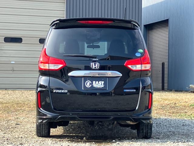 フリードハイブリッド ハイブリッド・Gホンダセンシング 4WD 本州仕入 後期型 ワンオーナー 寒冷地仕様 社外フルセグナビ バックカメラ 後席モニター シートヒーター ハーフレザーシート フルフラット 両側電動スライドドア LEDヘッドライト ETC(31枚目)