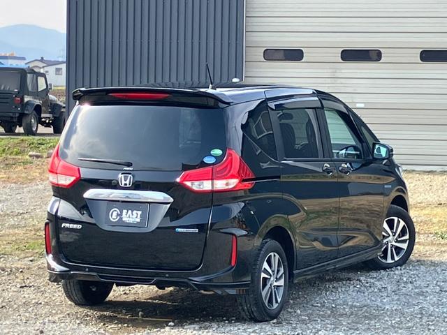 フリードハイブリッド ハイブリッド・Gホンダセンシング 4WD 本州仕入 後期型 ワンオーナー 寒冷地仕様 社外フルセグナビ バックカメラ 後席モニター シートヒーター ハーフレザーシート フルフラット 両側電動スライドドア LEDヘッドライト ETC(34枚目)