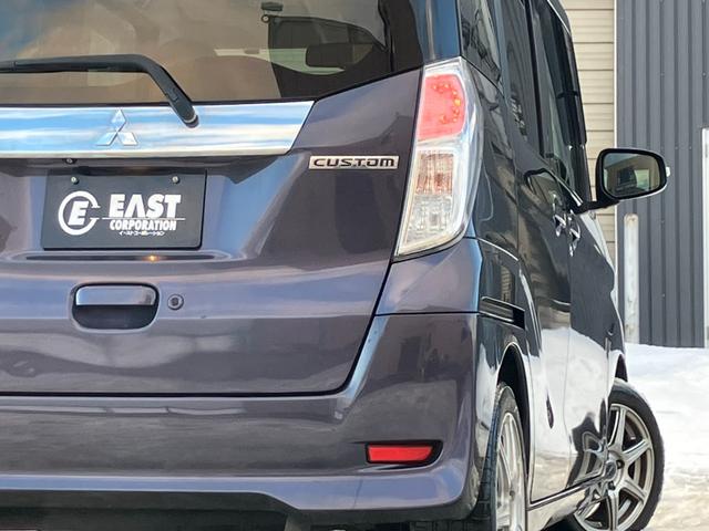 ｅＫスペースカスタム カスタムＴ　ｅ－アシスト　４ＷＤ　社外フルセグナビ　バックカメラ　Ｂｌｕｅｔｏｏｔｈ　シートヒーター　フルフラット　両側電動スライド　ＨＩＤヘッドライト　ＬＥＤフォグライト　社外アルミ　電格ミラー　プッシュスタート　ＥＴＣ（32枚目）