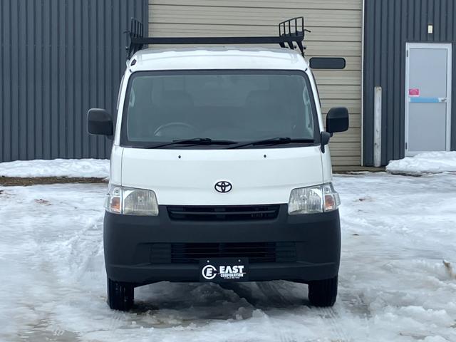 ライトエースバン ＧＬ　４ＷＤ　寒冷地仕様　リフトアップ　ワンオフルーフキャリア　リアラダー　前後バンパーエンブレム自社チッピング塗装　社外ワンセグナビ　バックカメラ　リアヒーター　リアフォグ　両側スライドドア　フルフラット（4枚目）