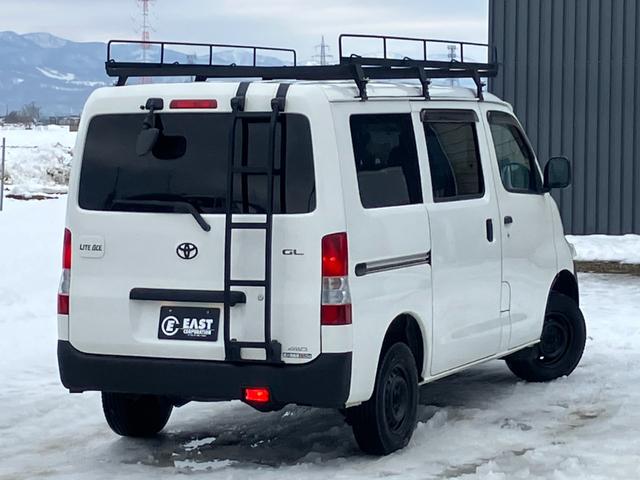 ライトエースバン ＧＬ　４ＷＤ　寒冷地仕様　リフトアップ　ワンオフルーフキャリア　リアラダー　前後バンパーエンブレム自社チッピング塗装　社外ワンセグナビ　バックカメラ　リアヒーター　リアフォグ　両側スライドドア　フルフラット（34枚目）