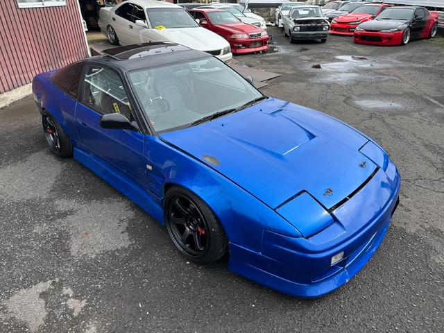 １８０ＳＸ タイプＩＩＩ　スーパーハイキャスパッケージ　サンルーフ　Ｒ０６ＭＩＤ１８インチＡＷ　機械式ＬＳＤ　フルエアロ　フルタップ車高調　前後ワイドフェンダー　ＢＬＩＴＺ前置きインタークーラー　フルバケ　社外マフラー　渚オートガッチリサポート（8枚目）