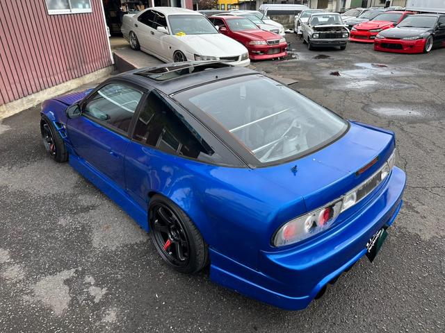 １８０ＳＸ タイプＩＩＩ　スーパーハイキャスパッケージ　サンルーフ　Ｒ０６ＭＩＤ１８インチＡＷ　機械式ＬＳＤ　フルエアロ　フルタップ車高調　前後ワイドフェンダー　ＢＬＩＴＺ前置きインタークーラー　フルバケ　社外マフラー　渚オートガッチリサポート（11枚目）