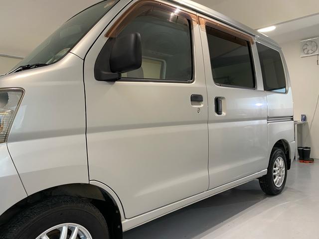 ハイゼットカーゴ ＤＸ　ワンオーナー車！　ナビ　ＴＶ　Ｂｌｕｅｔｏｏｔｈ接続　オートマ　キーレス　ラジオ　パワーウインドウ　集中ロック　運転席エアバッグ　助手席エアバッグ　パワーステアリング　社外アルミホイール　ドアバイザー（44枚目）