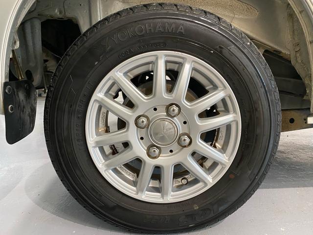 ハイゼットカーゴ ＤＸ　ワンオーナー車！　ナビ　ＴＶ　Ｂｌｕｅｔｏｏｔｈ接続　オートマ　キーレス　ラジオ　パワーウインドウ　集中ロック　運転席エアバッグ　助手席エアバッグ　パワーステアリング　社外アルミホイール　ドアバイザー（68枚目）