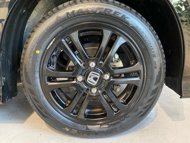 Ｎ－ＢＯＸカスタム Ｇ　ＳＳブラックスタイルパッケージ　禁煙車　新品タイヤ　全国対応１年保証付き　衝突被害軽減システム　両側電動スライドドア　ナビ　ＴＶ　Ｂｌｕｅｔｏｏｔｈオーディオ　アイドリングストップ　盗難防止システム　スマートキー　オート格納ミラー（70枚目）