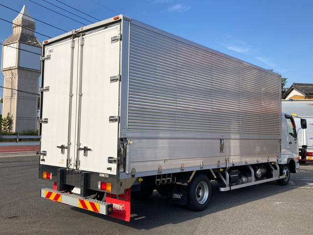 ファイター 三菱ふそう　中型アルミウイング　最大積載量２７５０ｋｇ　トレクス製アルミウイング　Ｒ５年３月製　６２００ワイドボディー　リアエアサス　ラッシングレール２段　セイコーラック２個　引き出しフック１０個　融雪使用車　フレーム防錆塗装（3枚目）