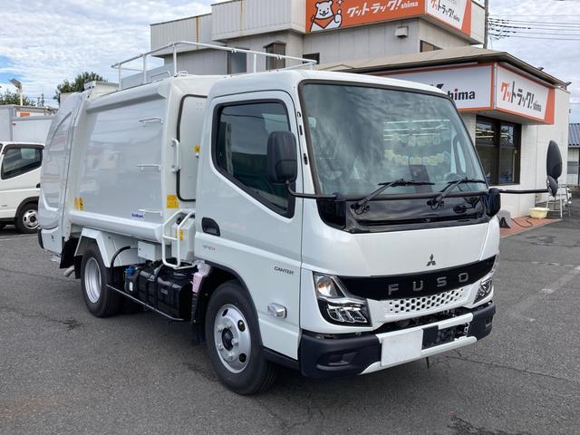 キャンター 三菱ふそう 小型塵芥車 4.3立米 最大積載2000kg 新明和製プレス式パッカー車 R7年4月製 4.3立米 汚水タンク 連続スイッチ 排出版式 標準幅 最大積載量2000kg 未稼働車(2枚目)