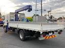 ヒノレンジャー 日野 中型 クレーン付平ボディー 最大積載2500kg タダノ4段(2.93t吊)ZX364HRSA R2年5月製 ラジコン フックイン 警報型 アウトリガー差違い セイコーラック2個 引き出しフック6個 標準ロングボディー(4枚目)