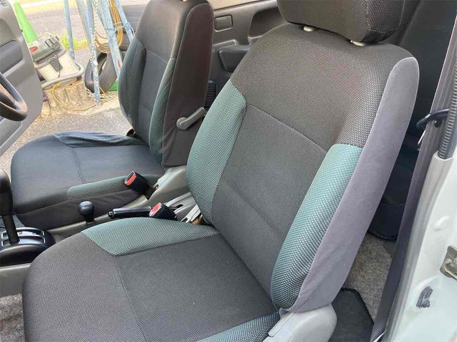 ジムニー ワイルドウインド　４ＷＤ　キーレスエントリー　ＡＴ　ＡＢＳ　ＣＤ　ＭＤ　カセット　アルミホイール　衝突安全ボディ　エアコン　パワーウィンドウ（9枚目）
