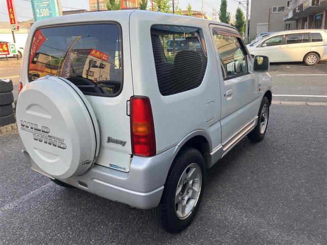 ジムニー ワイルドウインド　４ＷＤ　キーレスエントリー　ＡＴ　ＡＢＳ　ＣＤ　ＭＤ　カセット　アルミホイール　衝突安全ボディ　エアコン　パワーウィンドウ（15枚目）