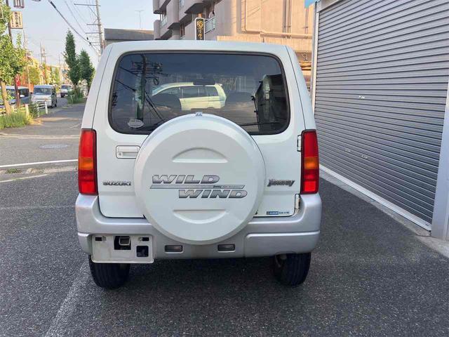 ジムニー ワイルドウインド　４ＷＤ　キーレスエントリー　ＡＴ　ＡＢＳ　ＣＤ　ＭＤ　カセット　アルミホイール　衝突安全ボディ　エアコン　パワーウィンドウ（16枚目）