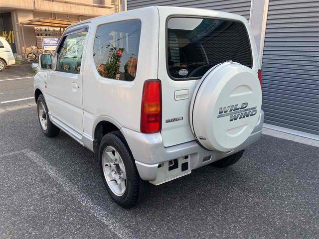 ジムニー ワイルドウインド　４ＷＤ　キーレスエントリー　ＡＴ　ＡＢＳ　ＣＤ　ＭＤ　カセット　アルミホイール　衝突安全ボディ　エアコン　パワーウィンドウ（17枚目）