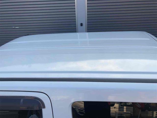 ジムニー ワイルドウインド　４ＷＤ　キーレスエントリー　ＡＴ　ＡＢＳ　ＣＤ　ＭＤ　カセット　アルミホイール　衝突安全ボディ　エアコン　パワーウィンドウ（19枚目）
