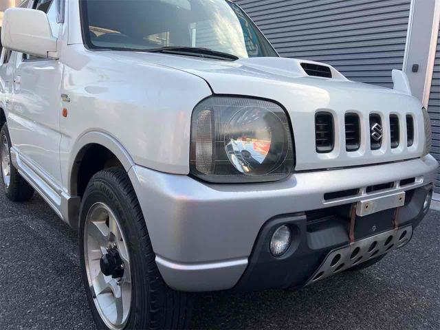 ジムニー ワイルドウインド　４ＷＤ　キーレスエントリー　ＡＴ　ＡＢＳ　ＣＤ　ＭＤ　カセット　アルミホイール　衝突安全ボディ　エアコン　パワーウィンドウ（22枚目）