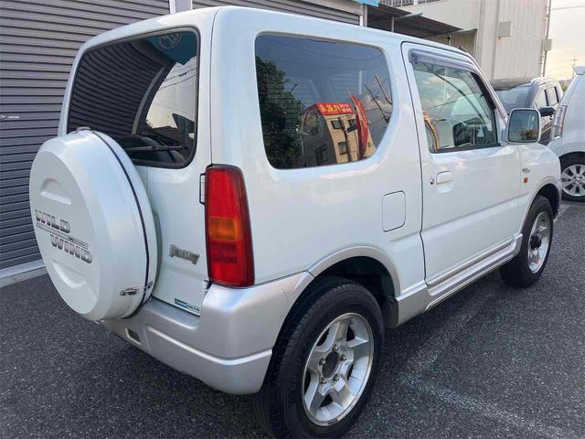 ジムニー ワイルドウインド　４ＷＤ　キーレスエントリー　ＡＴ　ＡＢＳ　ＣＤ　ＭＤ　カセット　アルミホイール　衝突安全ボディ　エアコン　パワーウィンドウ（23枚目）