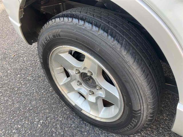 ジムニー ワイルドウインド　４ＷＤ　キーレスエントリー　ＡＴ　ＡＢＳ　ＣＤ　ＭＤ　カセット　アルミホイール　衝突安全ボディ　エアコン　パワーウィンドウ（24枚目）