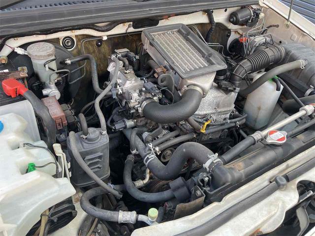 ジムニー ワイルドウインド　４ＷＤ　キーレスエントリー　ＡＴ　ＡＢＳ　ＣＤ　ＭＤ　カセット　アルミホイール　衝突安全ボディ　エアコン　パワーウィンドウ（29枚目）