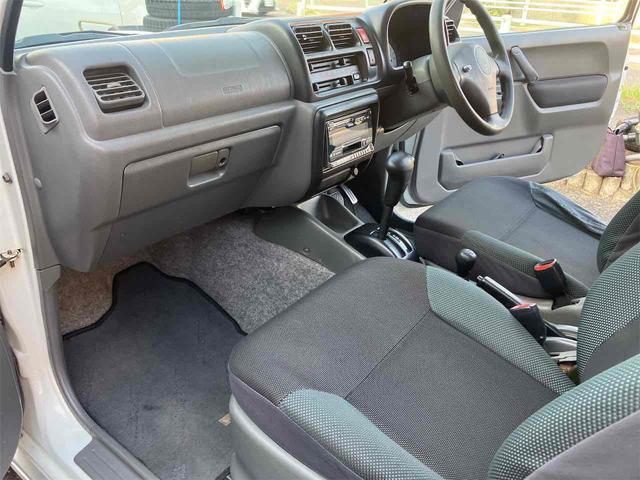 ジムニー ワイルドウインド　４ＷＤ　キーレスエントリー　ＡＴ　ＡＢＳ　ＣＤ　ＭＤ　カセット　アルミホイール　衝突安全ボディ　エアコン　パワーウィンドウ（35枚目）