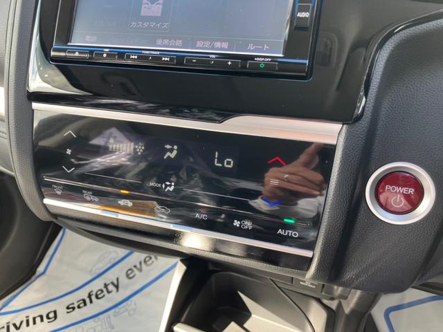 フィットハイブリッド ベースグレード　４ＷＤ　ドライブレコーダー　ＥＴＣ　バックカメラ　ナビ　オートライト　スマートキー　電動格納ミラー　ＡＴ　盗難防止システム　衝突安全ボディ　ＣＤ　ＤＶＤ再生　ＵＳＢ（11枚目）