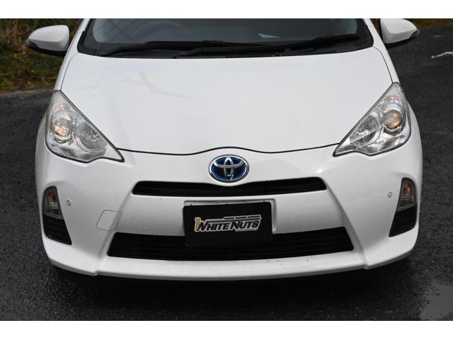 アクア Ｓ　ＨＶバッテリ－１年保証　ナビ　フルセグＴＶ　バックカメラ　社外ＡＷ　記録簿　Ｂｌｕｅｔｏｏｔｈ接続　スマートキー　ＣＤ　ＤＶＤ　横滑り防止装置　パワーウィンドウ　運転席／助手席エアバック　ＡＢＳ（22枚目）