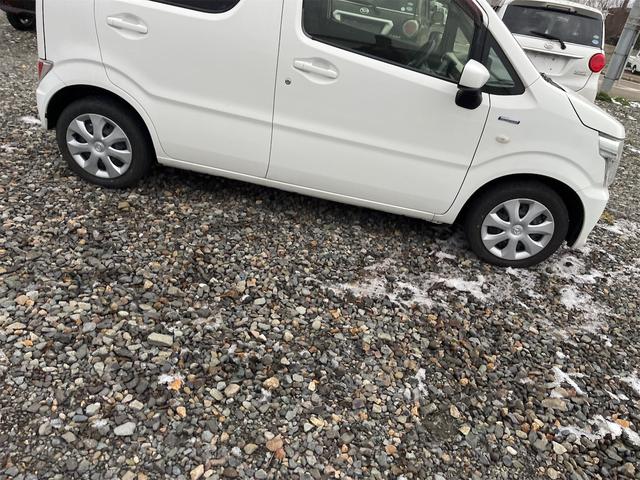 フレア ハイブリッドＸＧ　４ＷＤ　ナビ　キーレスエントリー　アイドリングストップ　電動格納ミラー　シートヒーター　ベンチシート　ＣＶＴ　盗難防止システム　ＡＢＳ　ＥＳＣ　衝突安全ボディ　エアコン　パワーステアリング（11枚目）