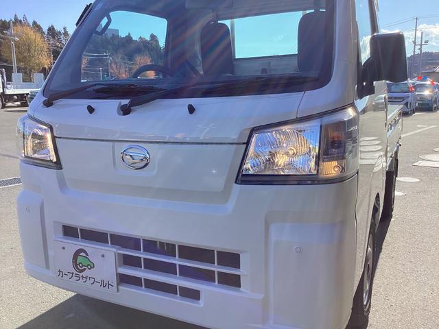 ハイゼットトラック スタンダード　４ＷＤ　５ＭＴ　届出済未使用車　スマートアシスト　ＡＭＦＭラジオ　電動式パワーステアリング　マニュアルエアコン　プリントレザーシート　リヤコンビネーションランプ　スーパーＵＶカットガラス　クリーンエアフィルター　クリアランスソナー（22枚目）