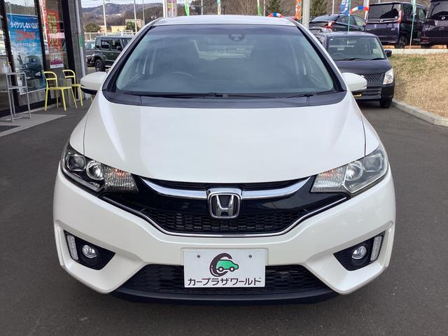 フィット １３Ｇ・Ｓパッケージ　シティーブレーキアシスト　純正８インチプレミアムインターナビ　フルセグＴＶ　ブルートゥース　ミュージックラック　ＤＶＤ再生　バックカメラ　ＥＴＣ　ドライブレコーダー　黒革調シートカバー　オートＬＥＤヘッドライト　アルミホイール（11枚目）