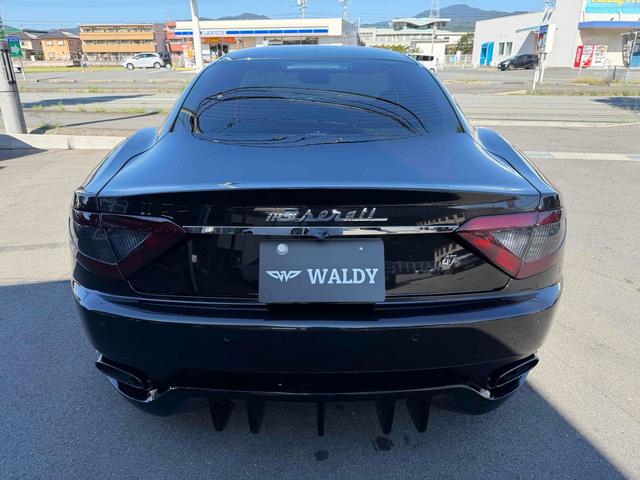 グラントゥーリズモ スポーツ MCオートシフト 車高調 中間パイプ EBM Fr21インチRr22インチ 左ハンドル バックカメラ カロッツェリアナビ クリアランスソナー オートライト CD DVD Bluetooth(7枚目)