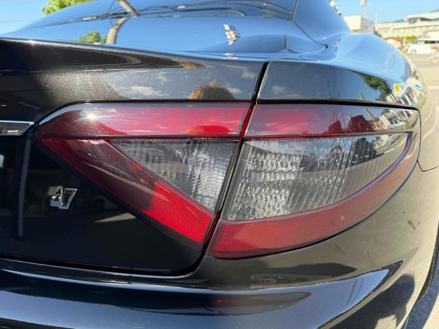 グラントゥーリズモ スポーツ MCオートシフト 車高調 中間パイプ EBM Fr21インチRr22インチ 左ハンドル バックカメラ カロッツェリアナビ クリアランスソナー オートライト CD DVD Bluetooth(18枚目)