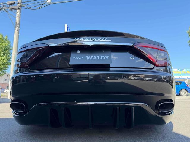 グラントゥーリズモ スポーツ MCオートシフト 車高調 中間パイプ EBM Fr21インチRr22インチ 左ハンドル バックカメラ カロッツェリアナビ クリアランスソナー オートライト CD DVD Bluetooth(24枚目)