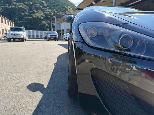 グラントゥーリズモ スポーツ MCオートシフト 車高調 中間パイプ EBM Fr21インチRr22インチ 左ハンドル バックカメラ カロッツェリアナビ クリアランスソナー オートライト CD DVD Bluetooth(27枚目)