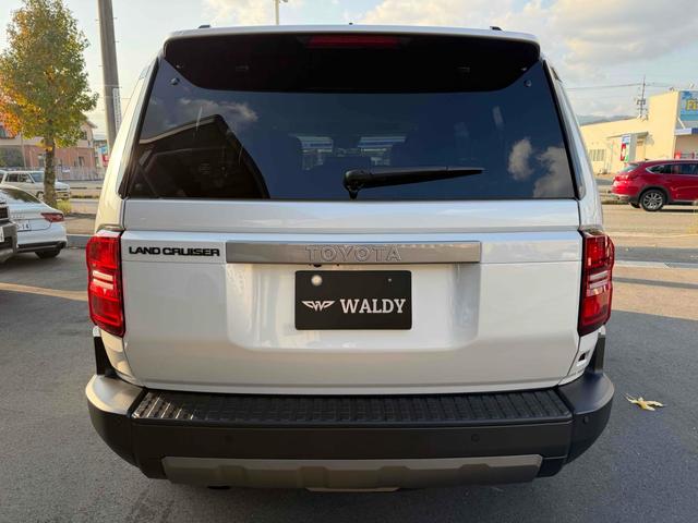 ランドクルーザー２５０ ＶＸ　サンルーフ　デジタルインナーミラー　パノラマビューモニター　ソナー　アダプティブクルーズコントロール　レーンアシスト　パワーシート　衝突軽減システム　ナビ　地デジＴＶ　Ｂｌｕｅｔｏｏｔｈ　オートライト（7枚目）