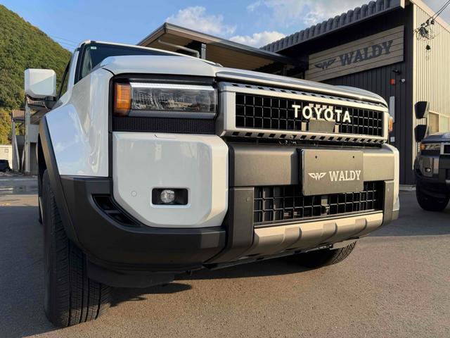 ランドクルーザー２５０ ＶＸ　サンルーフ　デジタルインナーミラー　パノラマビューモニター　ソナー　アダプティブクルーズコントロール　レーンアシスト　パワーシート　衝突軽減システム　ナビ　地デジＴＶ　Ｂｌｕｅｔｏｏｔｈ　オートライト（22枚目）