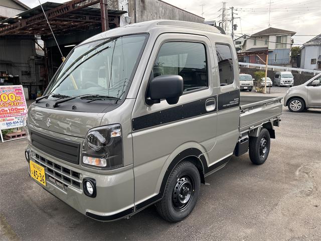 スーパーキャリイ Ｘリミテッド　Ｘリミテッド　４ＷＤ　登録済み未使用車　スズキセーフティサポート　ＬＥＤヘッドランプ　オートライト　キーレスエントリー　パワーウインドウ　電動格納ミラー　オーバーヘッドシェルフ　プライバシーガラス（7枚目）