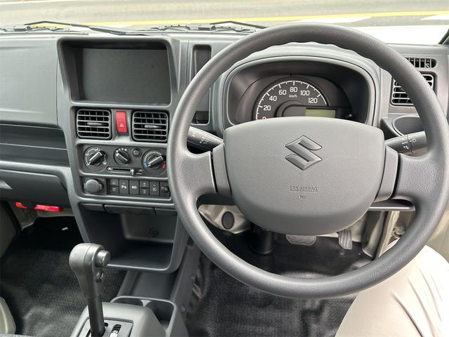 スーパーキャリイ Ｘリミテッド　Ｘリミテッド　４ＷＤ　登録済み未使用車　スズキセーフティサポート　ＬＥＤヘッドランプ　オートライト　キーレスエントリー　パワーウインドウ　電動格納ミラー　オーバーヘッドシェルフ　プライバシーガラス（10枚目）