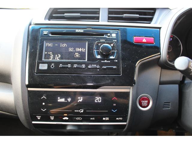 フィット １３Ｇ・Ｆパッケージ　ＥＴＣ　スマートキー　アイドリングストップ　電動格納ミラー　ＣＶＴ　盗難防止システム　衝突安全ボディ　ＡＢＳ　ＥＳＣ　ＣＤ　ＵＳＢ　ミュージックプレイヤー接続可　エアコン　パワーステアリング（5枚目）
