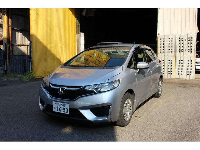 フィット １３Ｇ・Ｆパッケージ　ＥＴＣ　スマートキー　アイドリングストップ　電動格納ミラー　ＣＶＴ　盗難防止システム　衝突安全ボディ　ＡＢＳ　ＥＳＣ　ＣＤ　ＵＳＢ　ミュージックプレイヤー接続可　エアコン　パワーステアリング（12枚目）