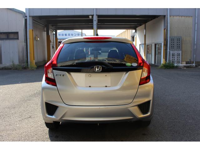 フィット １３Ｇ・Ｆパッケージ　ＥＴＣ　スマートキー　アイドリングストップ　電動格納ミラー　ＣＶＴ　盗難防止システム　衝突安全ボディ　ＡＢＳ　ＥＳＣ　ＣＤ　ＵＳＢ　ミュージックプレイヤー接続可　エアコン　パワーステアリング（18枚目）