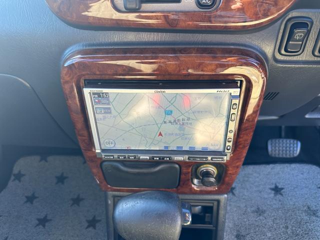 ミラジーノ ミニライトスペシャル　ナルディステアリング　Ｌ８８０Ｋコペン足回り　Ｌ８８０ＫコペンＦブレーキ　ナビ　キーレスエントリー　ＡＴ　アルミホイール　衝突安全ボディ　エアコン　パワーステアリング　パワーウィンドウ（3枚目）